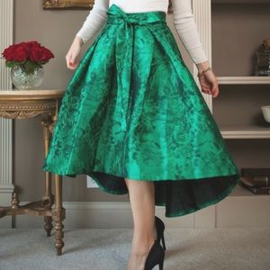 Emerald green Jacquard skirt with bow.